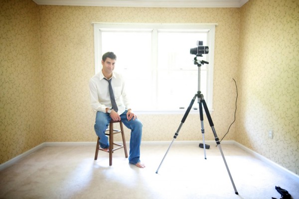 groom-wtih-vintage-camera